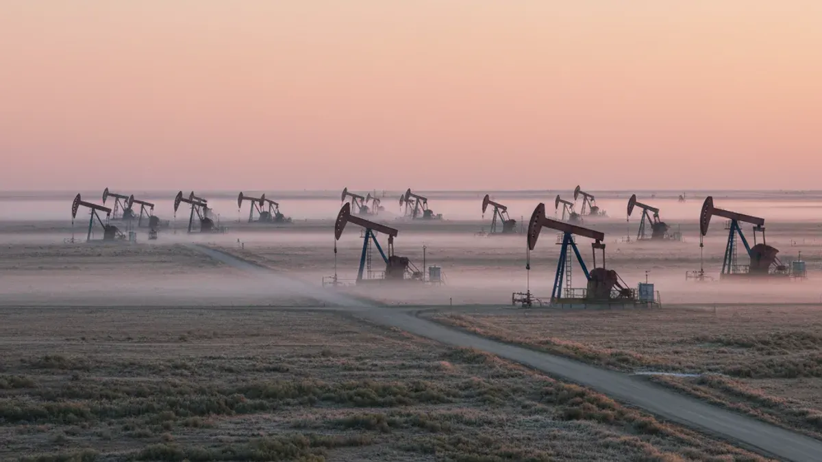 Editorial image: Dawn pumpjack field panorama - Norway's Maxed-Out Output Signals Tighter Global Supply for Field Operators