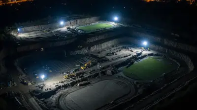 Editorial image: Night aerial quarry redevelopment site - Quarry-to-Park Project Shows Cost Control Success for Construction Teams