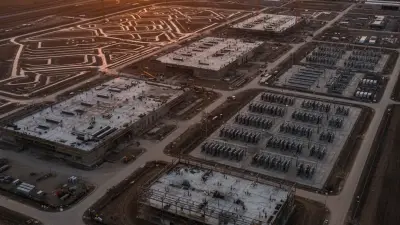 Editorial image: Data center campus aerial dusk - Turner's $29B revenue surge signals massive subcontractor opportunities in data centers