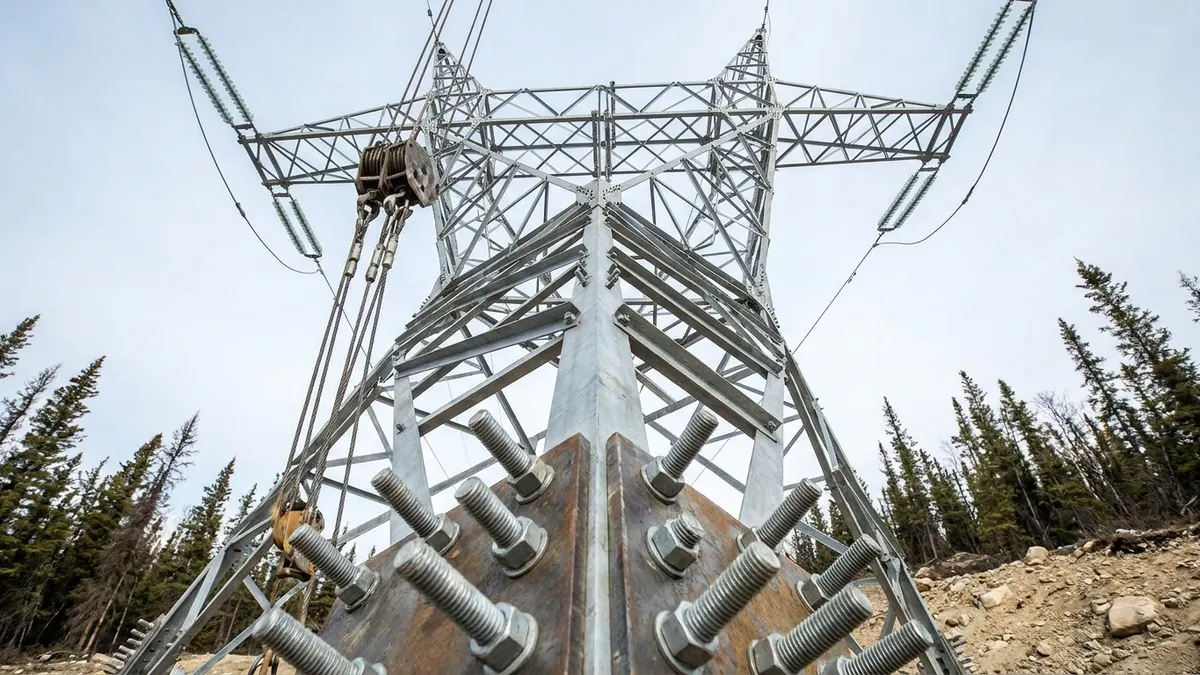 Editorial image: Transmission tower under construction - Hydro One Files for Approval on Two Major Ontario Transmission Projects Totaling $3 Billion