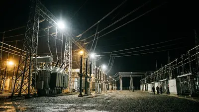 Editorial image: Substation night dramatic contrast - NextEra-Dominion $67B Merger Would Create World's Largest Electric Utility