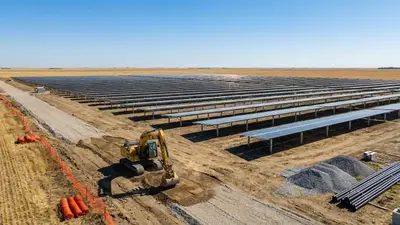 Editorial image: Solar farm construction, prairie flatlands - $15M Federal Investment Launches 100 MW Solar Project Near Estevan, Saskatchewan