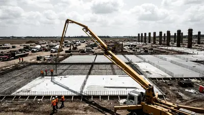 Editorial image: Massive data center foundation pour - $16B Saline Barn Data Center Breaks Ground in Michigan, Largest in North America