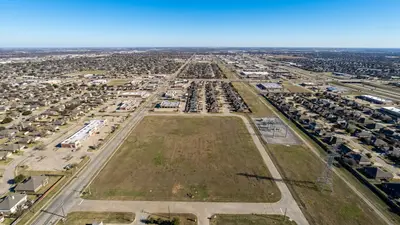 Editorial image: Vacant lot awaits city verdict - Broken Arrow Weighs Six-Month Data Center Moratorium as Council Cites Infrastructure Strain