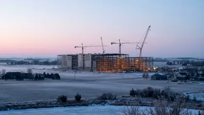 Editorial image: Industrial site dawn, Midwest - Industrial Construction Holds Steady in Upper Midwest as Commercial, Residential Activity Falls