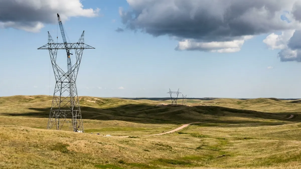 Editorial image: Transmission tower invades Sandhills - Nebraska Approves 220-Mile Sandhills Transmission Line Over Landowner Objections