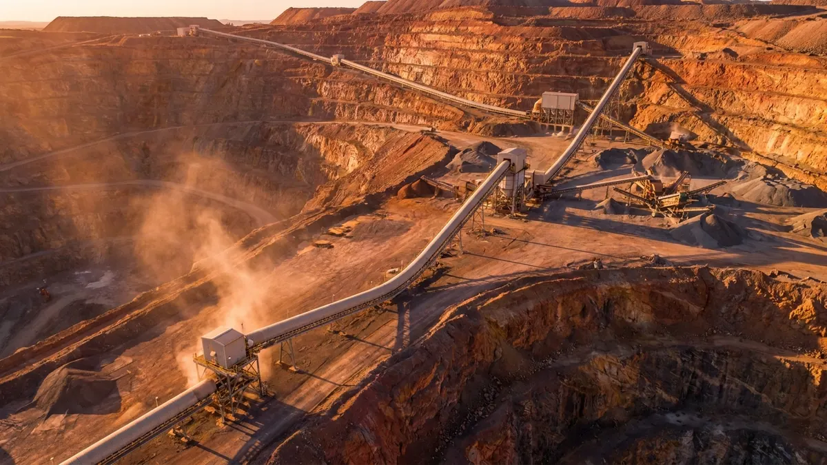 Editorial image: Aerial mine conveyor dust control - NIOSH-Validated Silica Filtration System Cuts Respirable Dust by 93% at Mine Sites