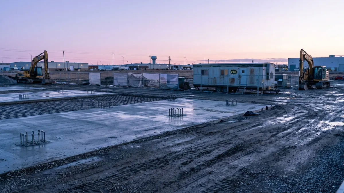Editorial image: Transit facility groundbreaking at dawn - PCL Breaks Ground on $80M Guelph Transit and Fleet Facility