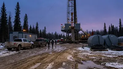 Editorial image: Clearwater rig at dusk, boreal Alberta - Alberta's Clearwater Oil Play Sparks Biggest Drilling Permit Surge Since 2014