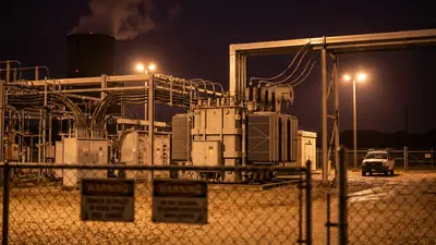 Editorial image: Gas plant switchyard at night, deal in limbo - Entergy's $1.8B Texas Gas Plant Deal Faces Growing Doubt