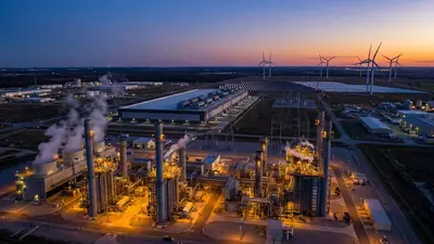 Editorial image: Gas plant versus renewables, aerial - Gas-Fired Power Boom for AI Data Centers Sparks Clean Energy Pushback