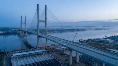 Editorial image: New international bridge span at dawn - Gordie Howe Bridge to Open July 27, Adding Second Detroit-Windsor Span