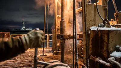Editorial image: Night close-up, Canadian rig machinery - Precision Drilling Sees Canadian Rig Demand Jump 22% on Strong Oil Prices