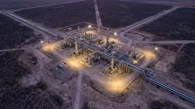 Editorial image: Aerial dusk view of gas processing plant - San Mateo JV to Acquire Cardinal Midstream Assets for $752M in Delaware Basin