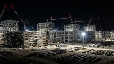 Editorial image: Five LNG trains under construction, night - XRG Now Holds Stakes in All Five Rio Grande LNG Trains