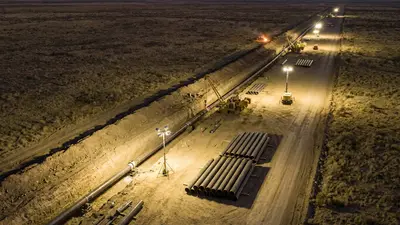 Editorial image: Aerial night CO2 pipeline construction corridor - CO2 Pipeline Buildout Could Open Major New Market for Pipeline Contractors