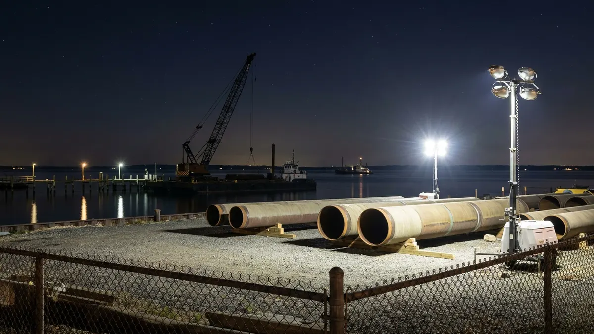 Editorial image: Pipeline staging yard at night - Court Upholds NY Water Permit for Williams' $1B Gas Pipeline