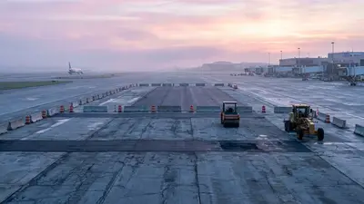 Editorial image: Airport taxiway reconstruction at dawn - FAA Awards $870M in Airport Grants Across 44 States, Two Territories