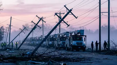 Editorial image: Mutual aid crews restoring storm damage - Mutual Aid Crews Restore 90% of Power After EF-3 Tornado Hits Menasha, Wisconsin