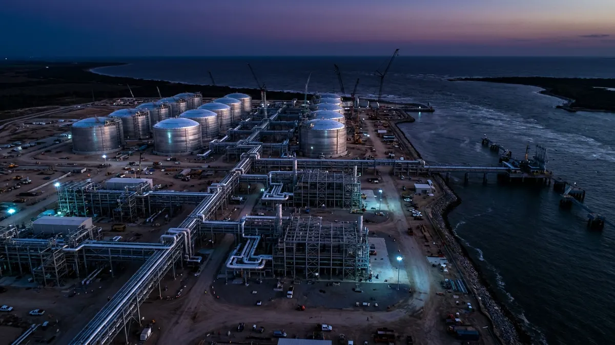 Editorial image: Aerial dusk LNG terminal construction - New Wave of US LNG Terminals Set to Add Nearly 8 Bcf/d by 2028