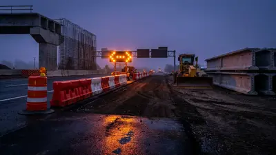 Editorial image: Highway widening bridge work at dusk - Oklahoma DOT Awards $113M in Highway Contracts, Two Major Projects Detailed