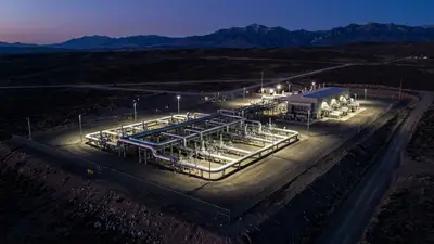 Editorial image: aerial pipeline compressor station at dusk - Western Midstream Operators Push for Faster Gas Pipeline Expansion