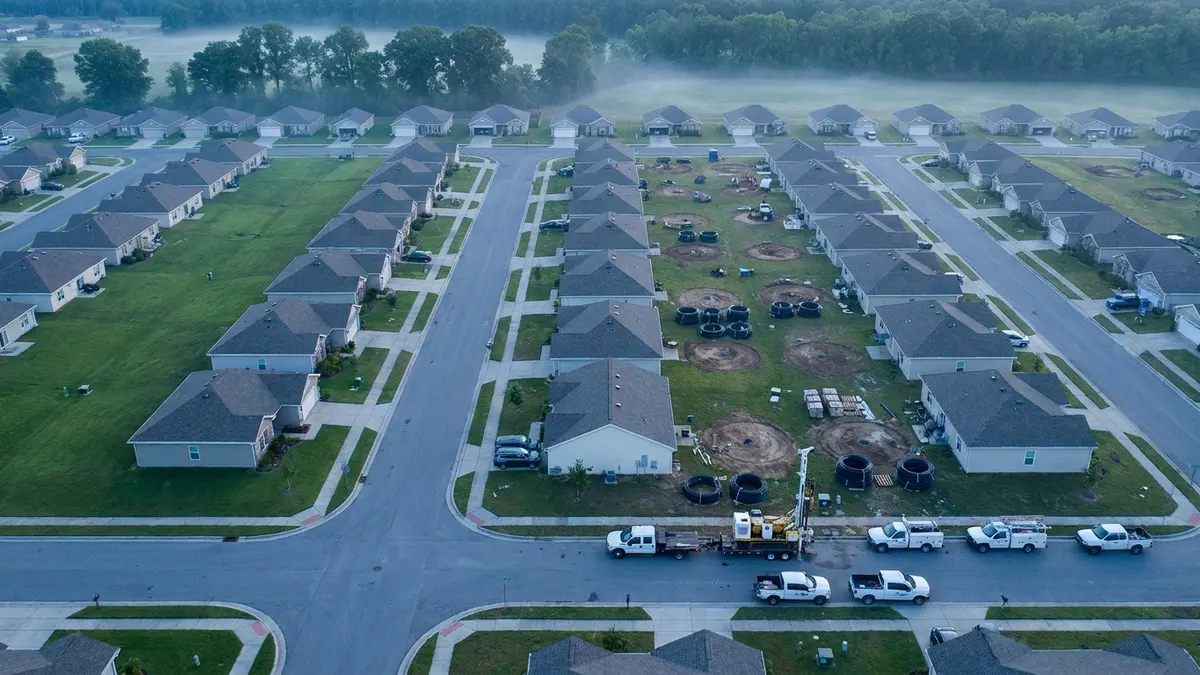 Editorial image: Aerial dawn view of geothermal housing retrofit - Fort Sill $63M Geothermal Retrofit Signals More DoD HVAC Bid Packages