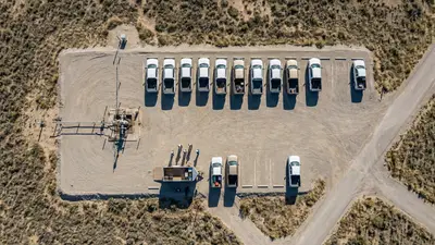 Editorial image: aerial crew staging area, workforce - Oil and Gas Extraction Jobs Edge Up in August, BLS Data Shows