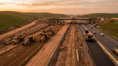 Editorial image: Aerial highway widening corridor - DOT Awards $426M in INFRA Grants Across 12 States, Led by Kentucky and I-4